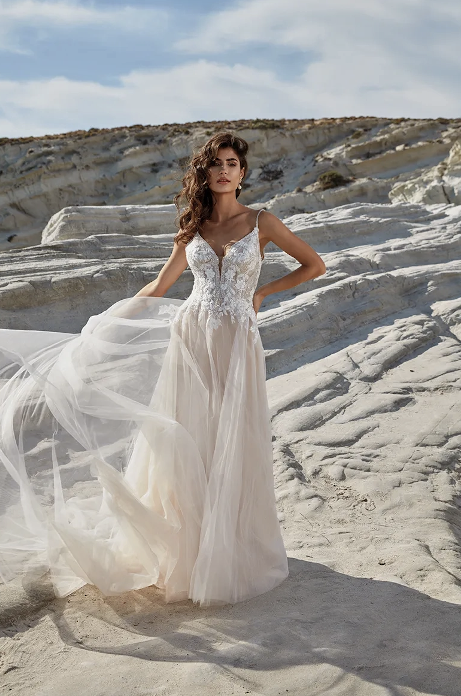 Model wearing Loredana wedding dress by Eddy K 