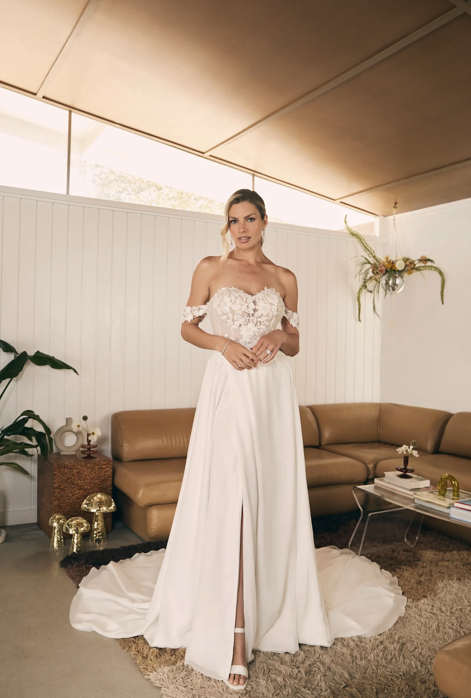 Model wearing Oakley wedding dress by Beloved by Casablanca